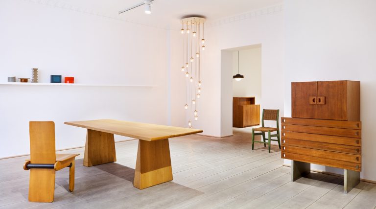 Ceramic objects, pendant lights and wood furniture on view at Jochum Rodgers gallery in Berlin