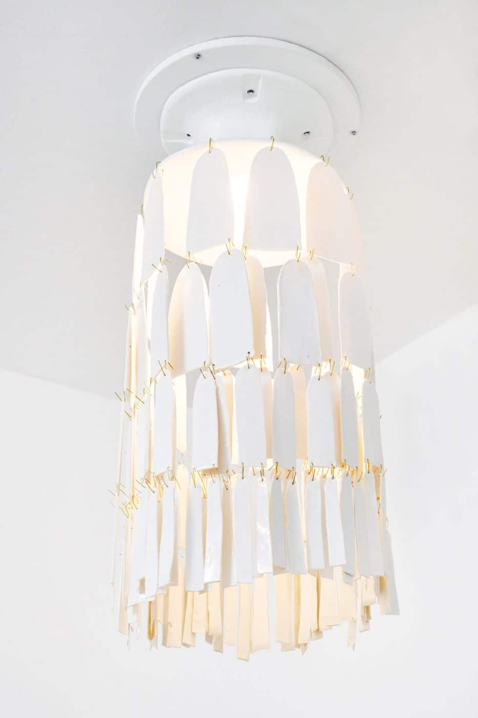 A white porcelain chandelier by Danish ceramist Christine Roland
