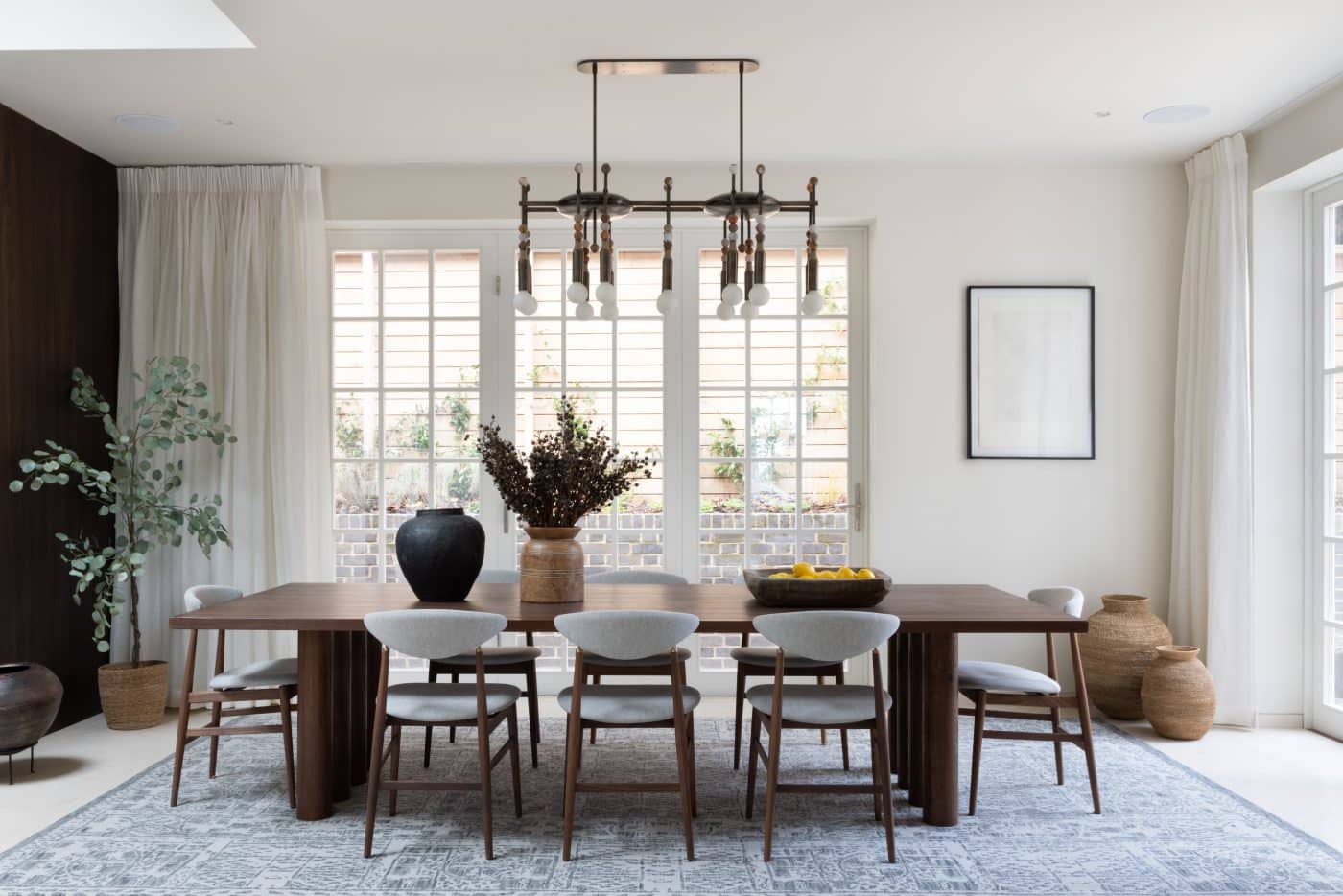dining room with Nathan Lindberg table and Gubi dining chairs