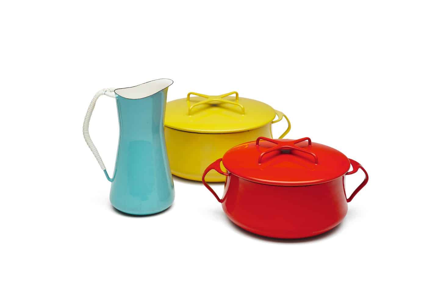 A Dansk Købenstyle light-blue pitcher, red casserole dish and yellow casserole dish, designed by Danish sculptor Jens H. Quistgaard
