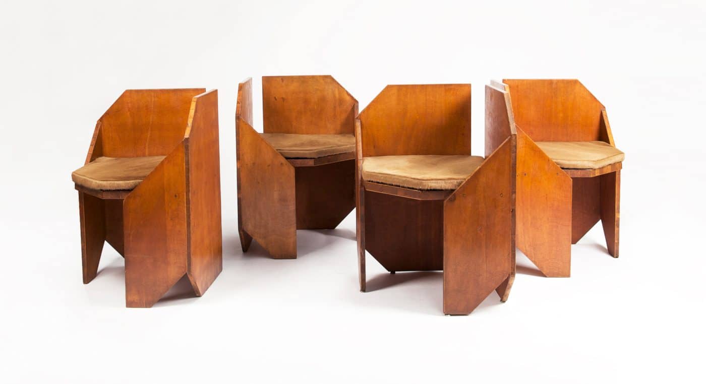 Four wooden chairs designed by Hervé Baley