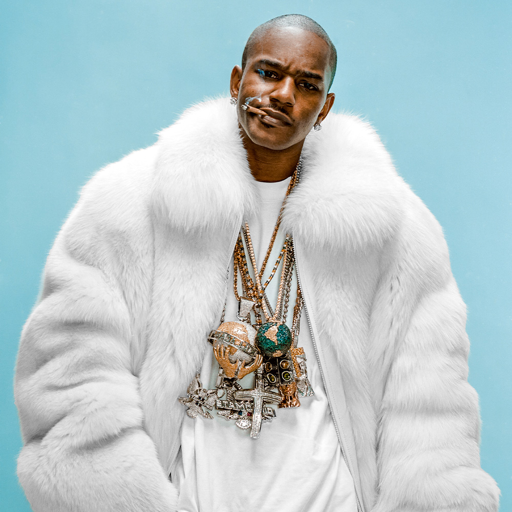 Portrait of Cam’ron in layered necklaces from Taschen book Ice Cold: A Hip-Hop Jewelry History book by Vikki Tobak