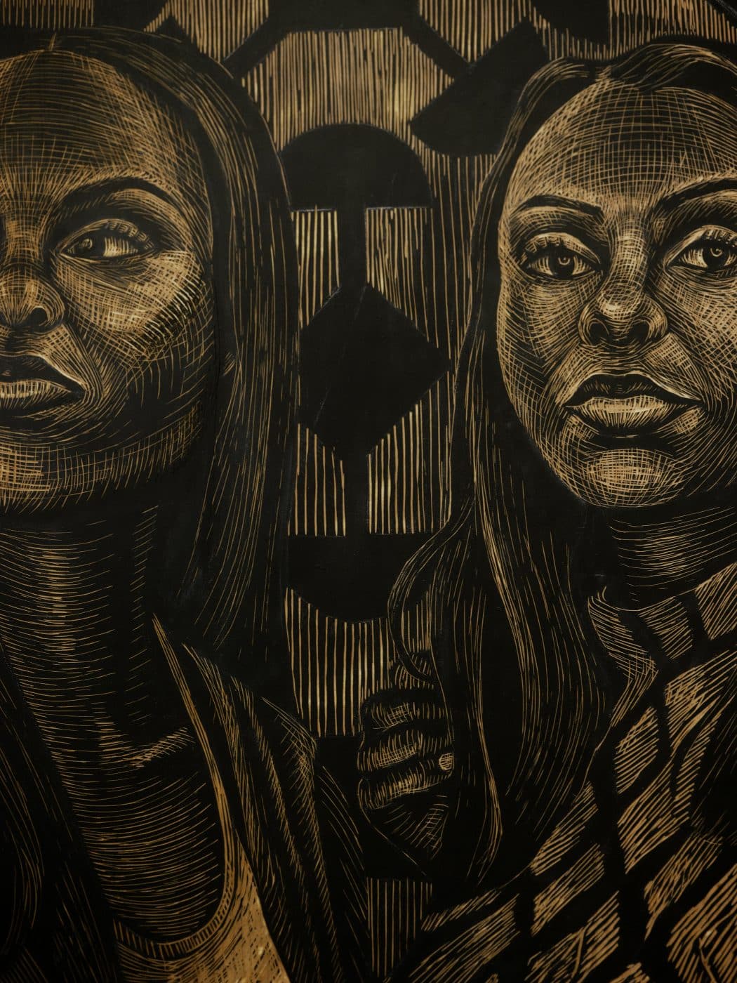 A detail of the woodcut panel 'Genette's Daughters,' by LaToya M. Hobbs