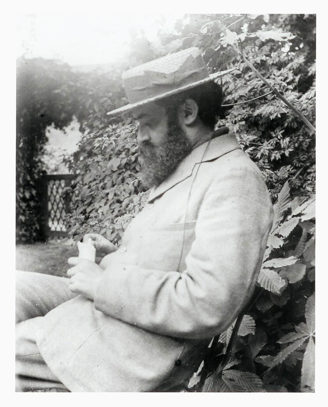 A black-and-white photo of illustrator Lucien Pissarro