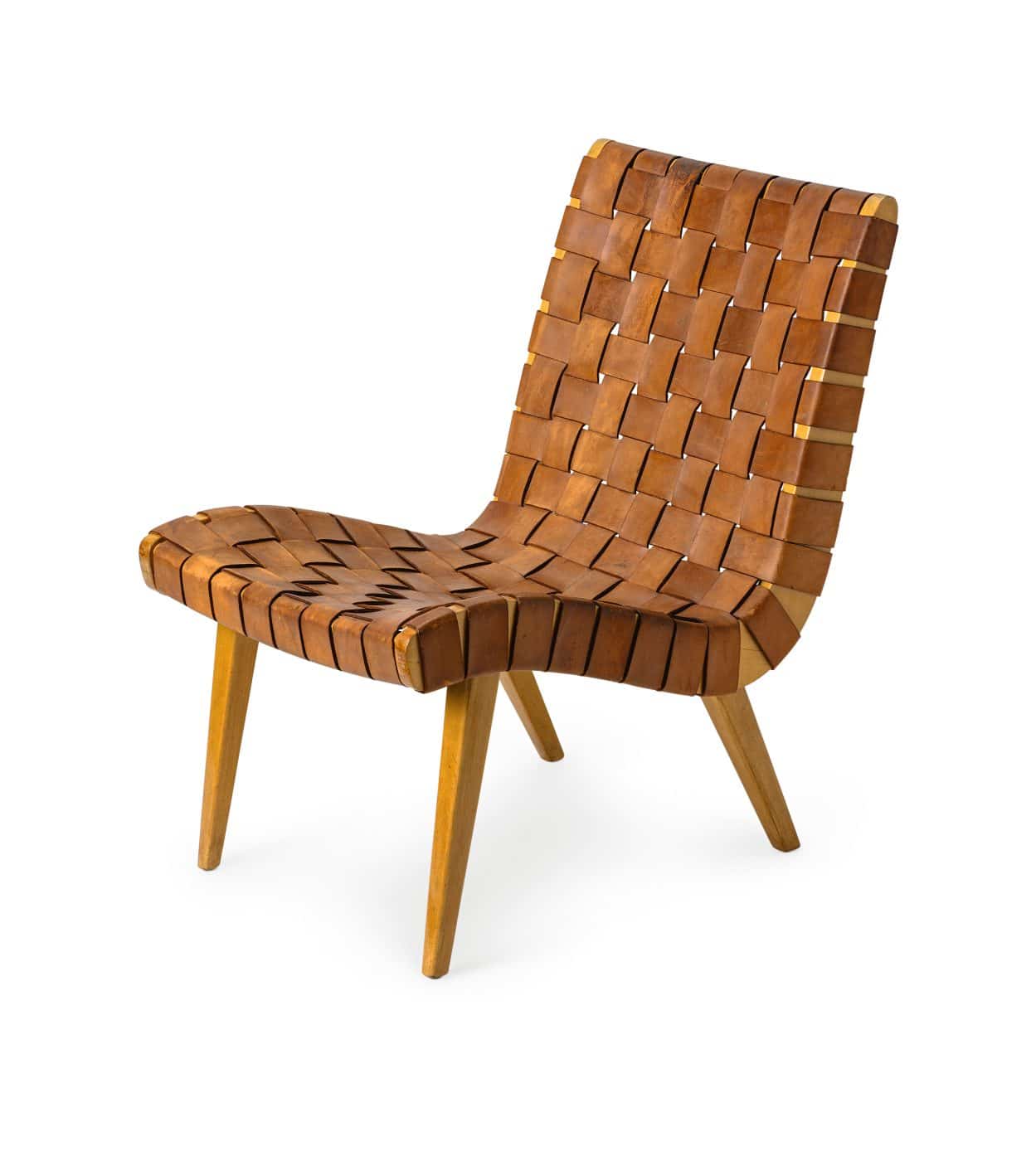 A woven-leather lounge chair by Danish-American designer JENS RISOM for Knoll