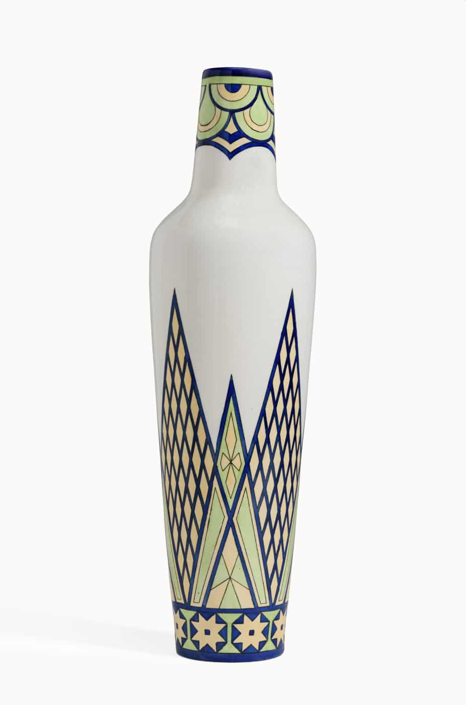 A white vase by Finnish company Arabia with a blue, yellow and light-green design