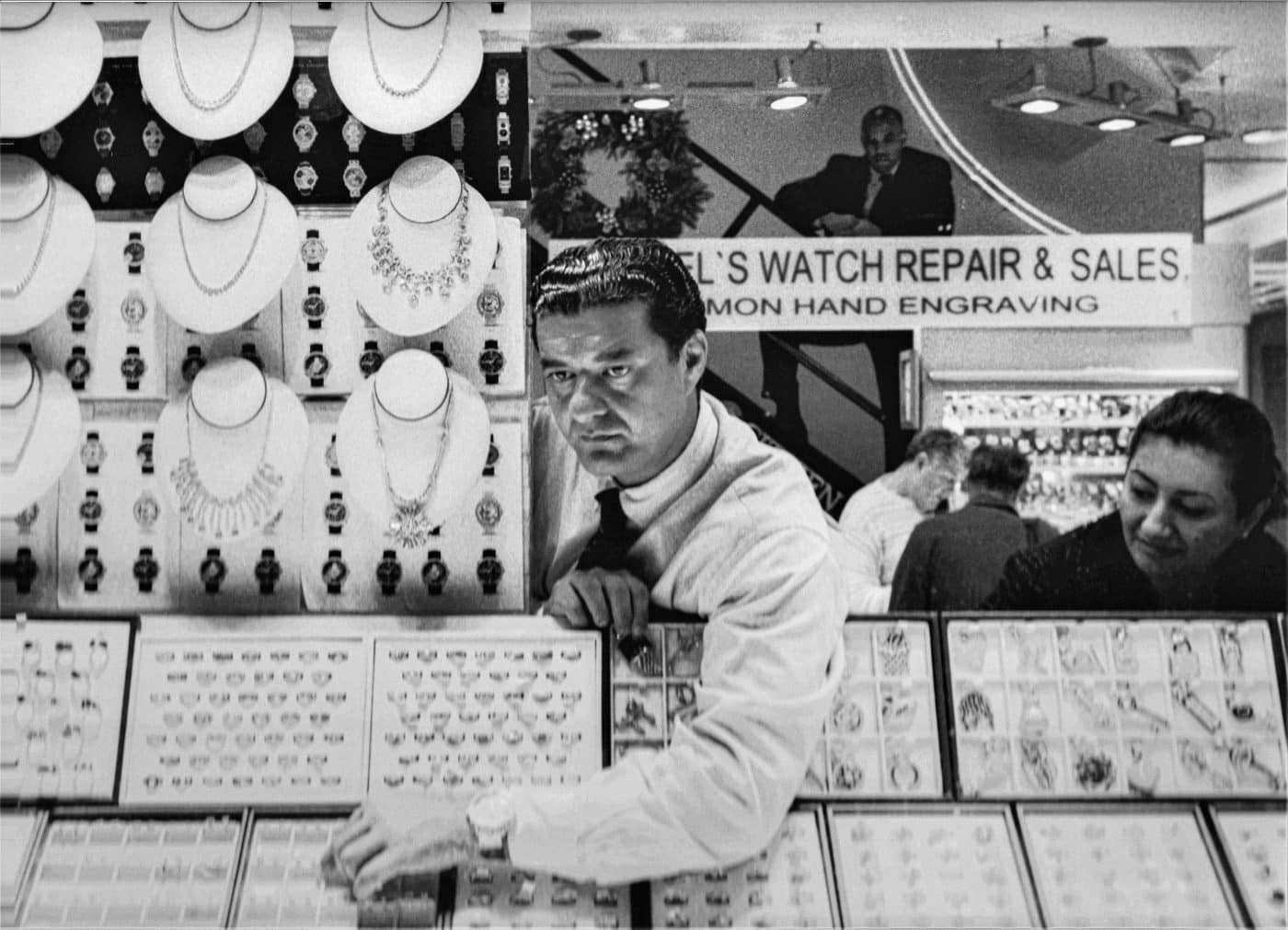 Black and white portrait of Jacob the Jeweler Arabo at his shop Jacob & Co. from Taschen book Ice Cold: A Hip-Hop Jewelry History book by Vikki Tobak