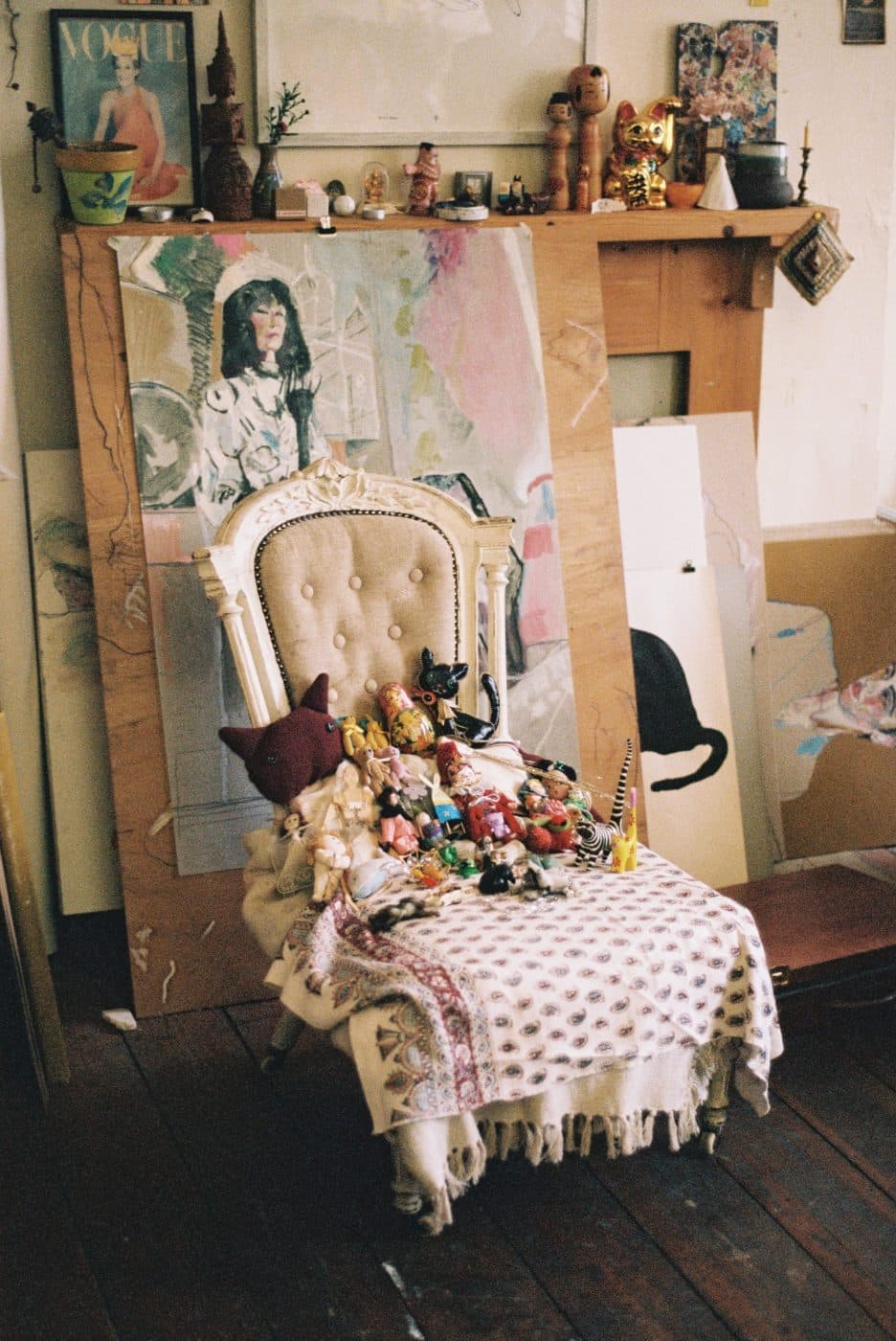 dolls on a chair in Howard Tangye's studio