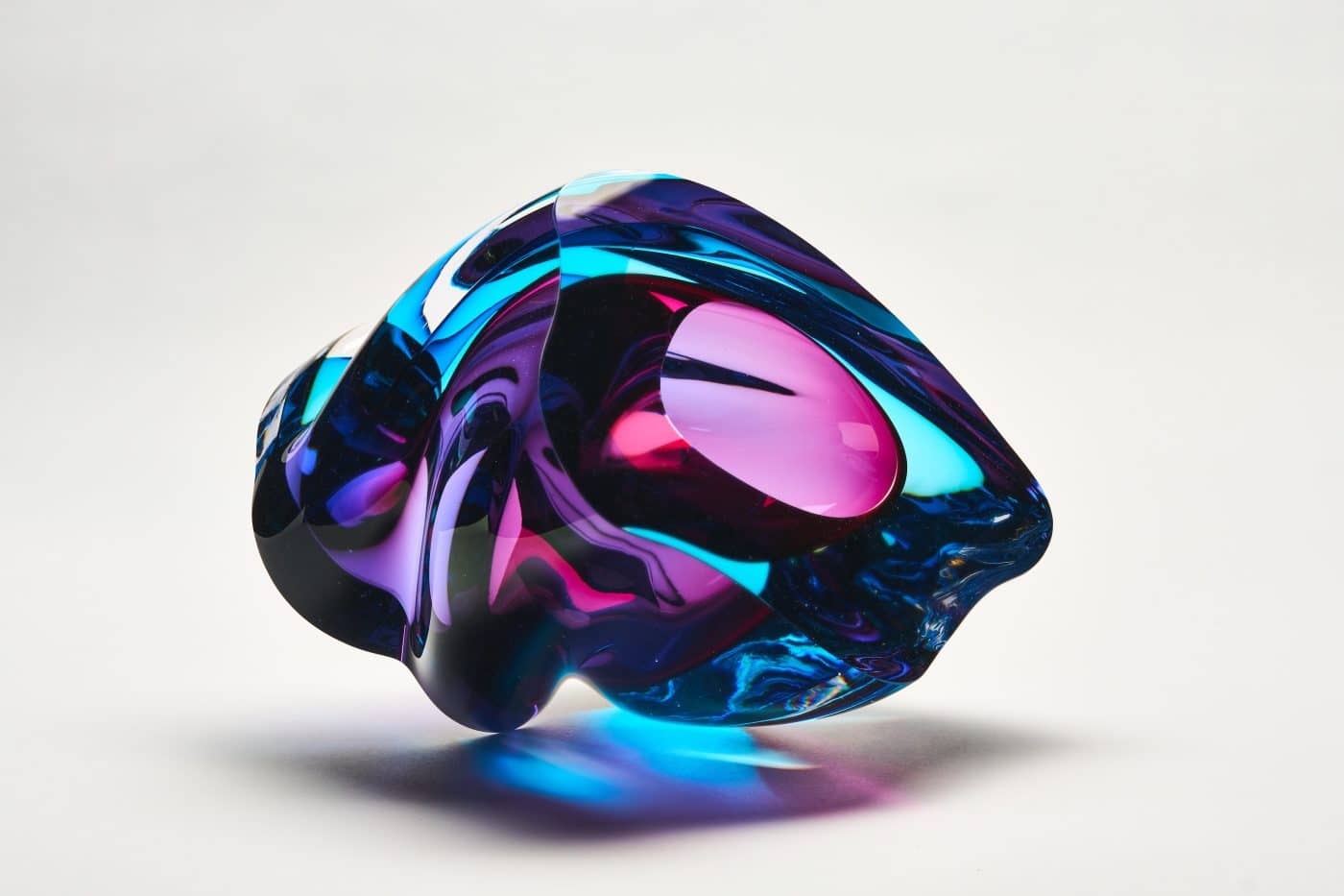 Blue and purple glass sculpture by Tim Rawlinson
