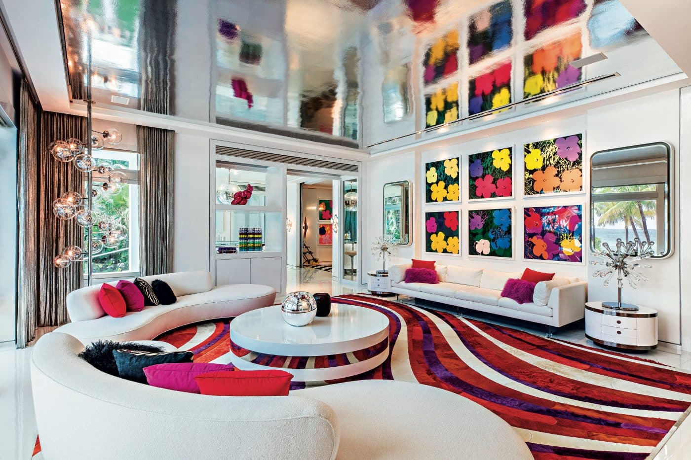 Assouline new book Pop Art Style by Julie Belcove Tommy Hilfiger Florida living room with Andy Warhol flowers