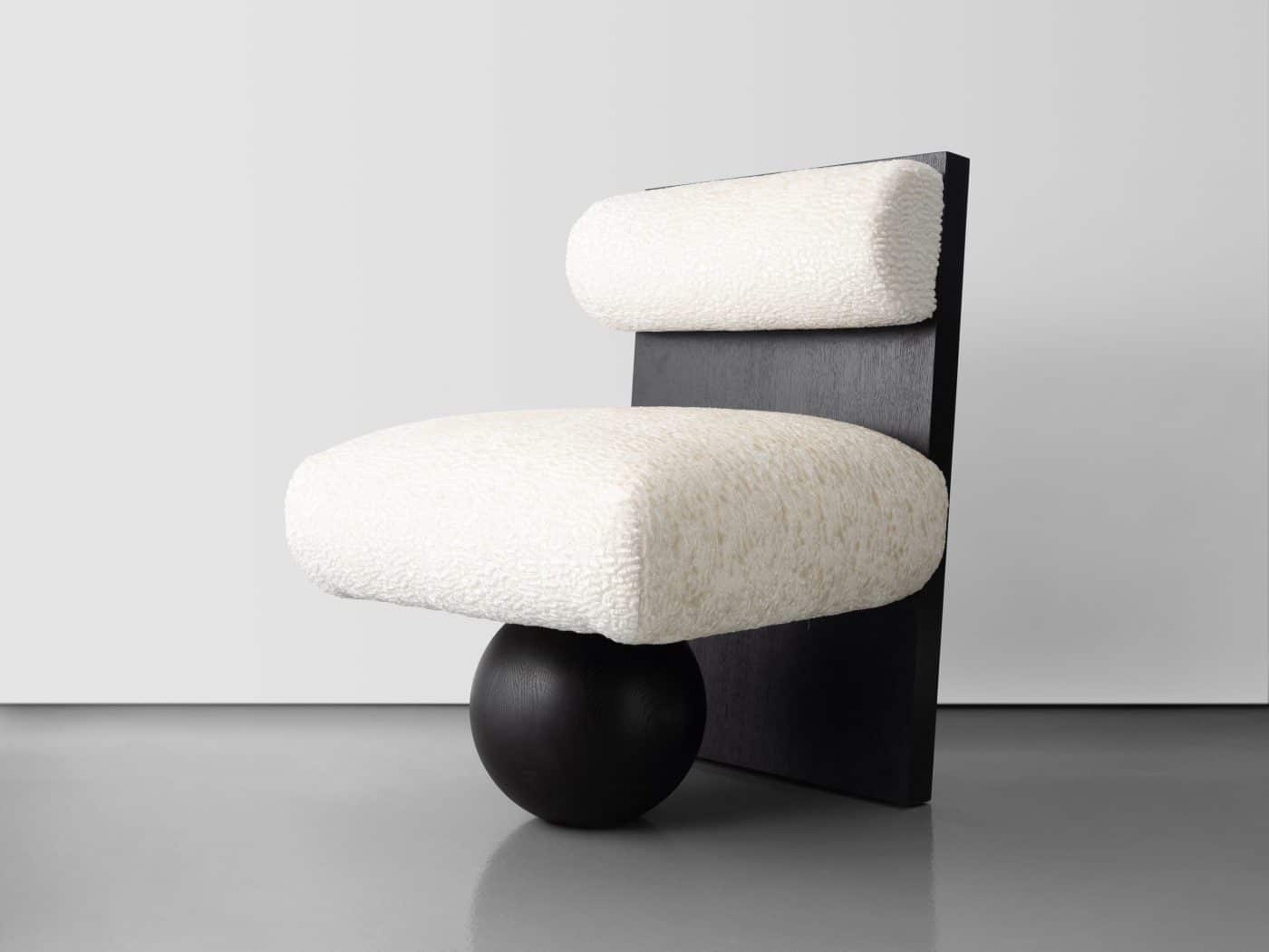Lounge chair in ebonized oak with white faux-lamb-fur upholstery by Rodney Lawrence and Igor Bernardes 