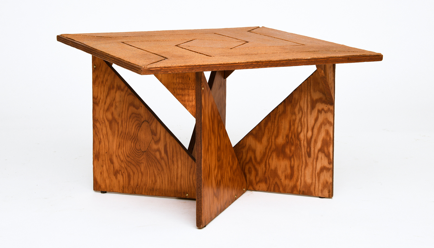 A Hervé Baley coffee table with a cork top and plywood base