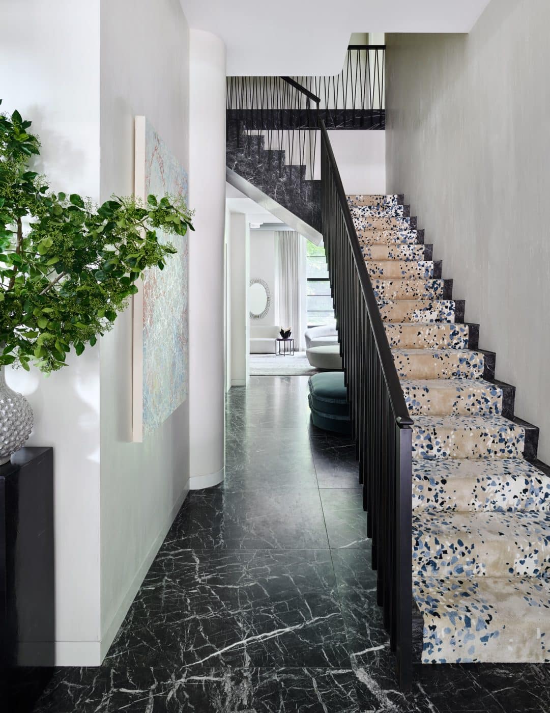 Entry and stairs in maisonette project in New York City's West Village by interior designer Daun Curry