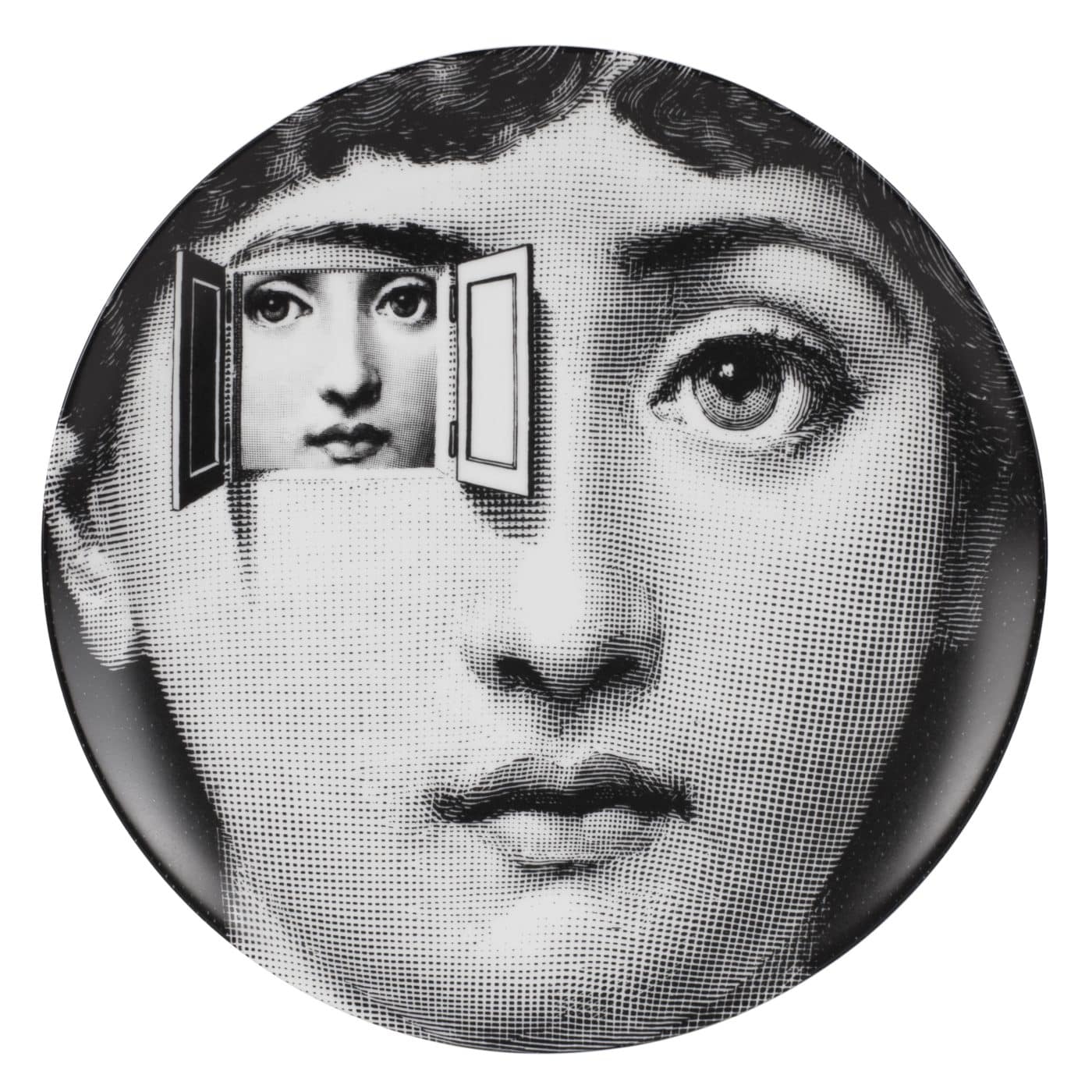 A porcelain plate decorated with a black-and-white print of a woman's  face. In place of her left eye is a window with open shutters revealing a smaller picture of her face.
