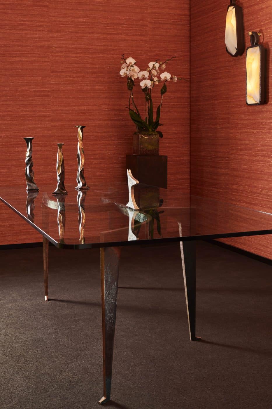 A glass-topped table in the room for lighting displays at the Achille Salvagni Atelier on Madison Avenue in New York