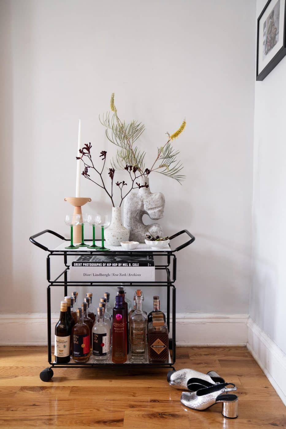 The bar cart in the dining room of Naomi Elizée's Brooklyn apartment