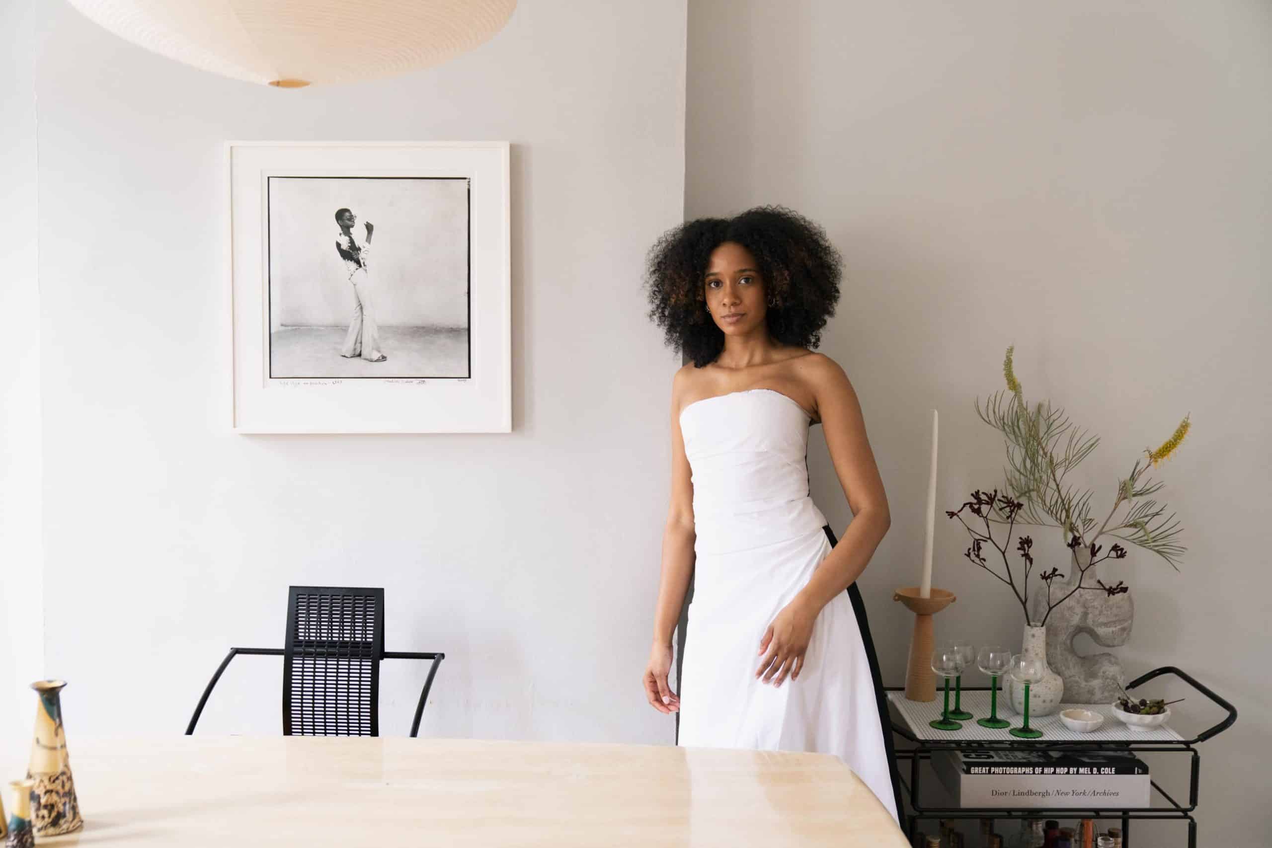 Naomi Elizée in the dining room of her Brooklyn apartment