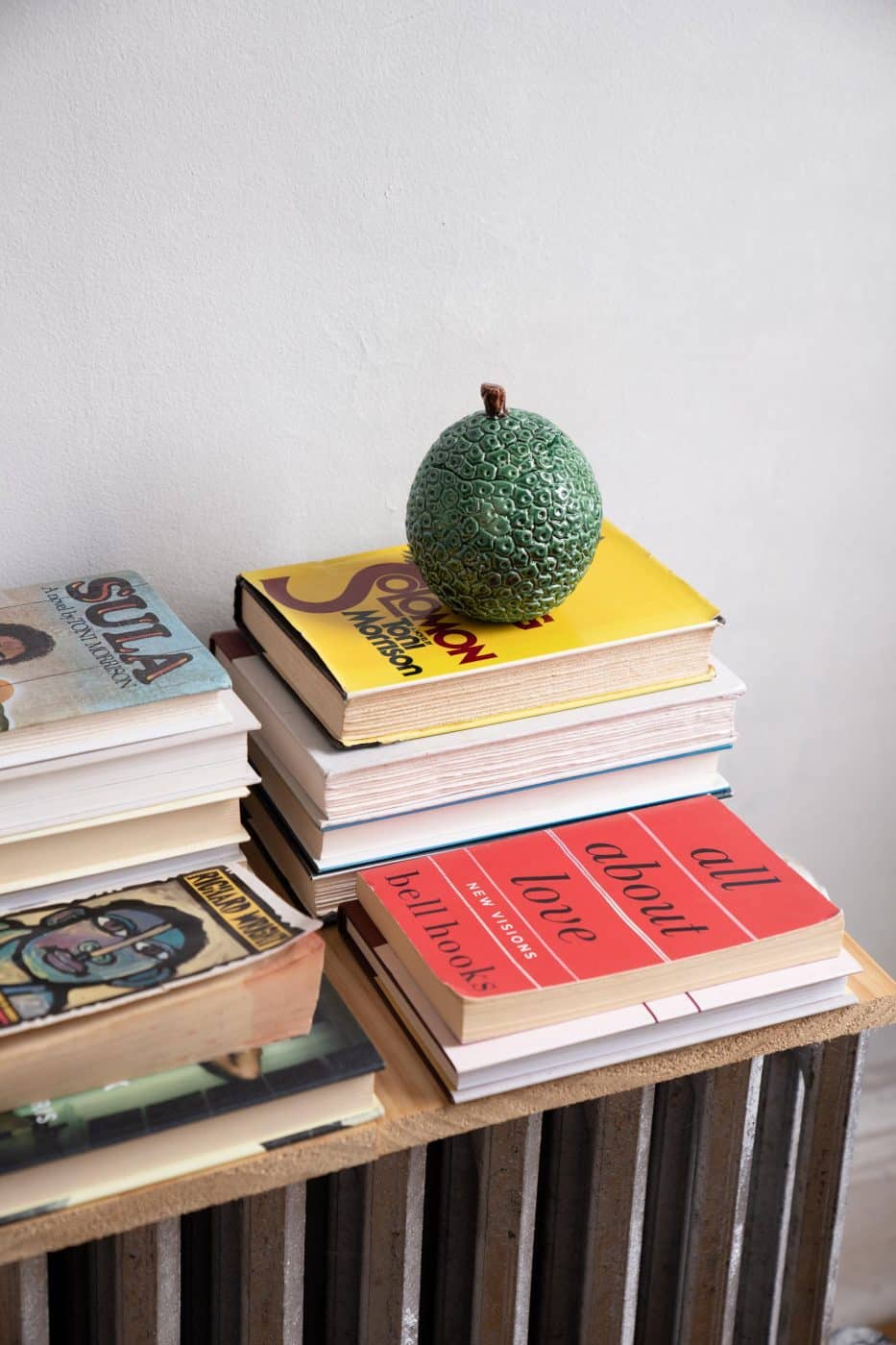 A makeshift bookshelf in the living room of Naomi Elizée's Brooklyn apartment