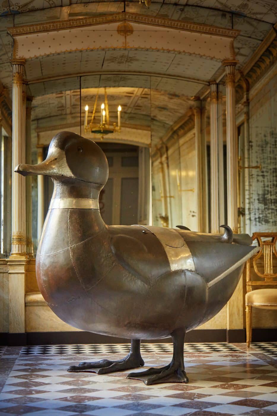 Grand Canard statue sculpture with storage compartment created by French artist and designer François-Xavier Lalanne for a private client, seen in the front hall of the owner's manor house Assouline book Lalanne: A World of Poetry