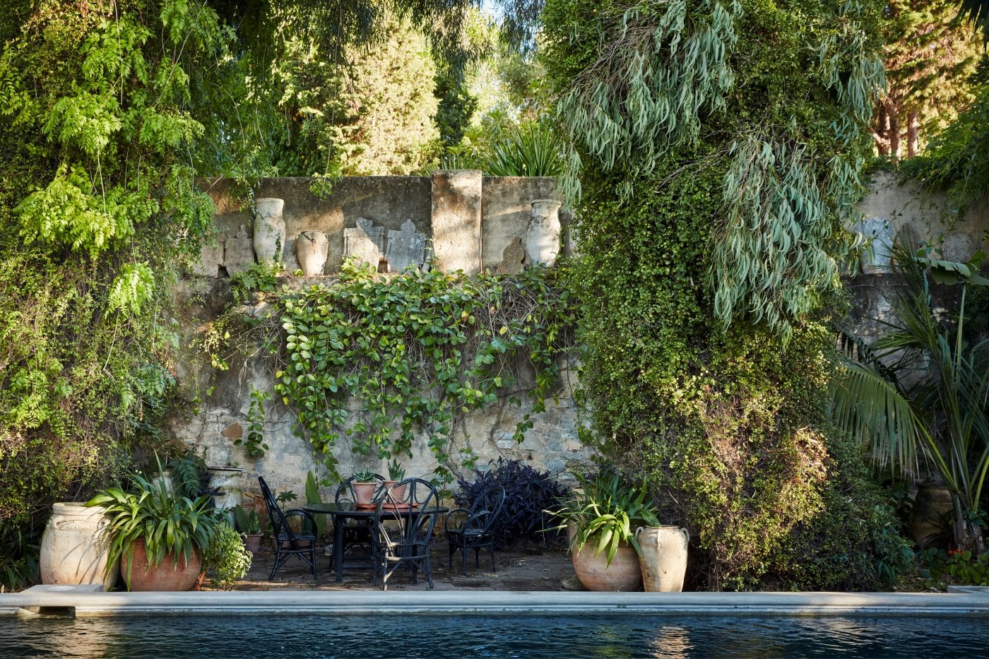 Pool and walled garden at home of Umberto Pasti and Stephan Janson as featured in the Rizzoli book The House of a Lifetime: A Collector's Journey in Tangier Morocco 
