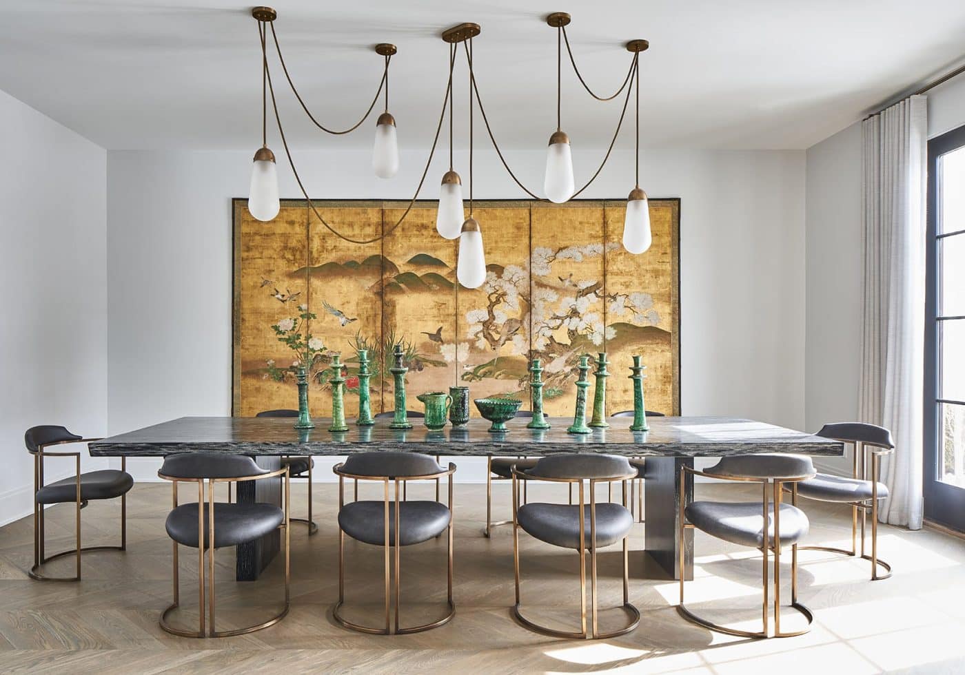 Interior designer Michelle Gerson dining room in her own New Jersey home featuring a japanese screen