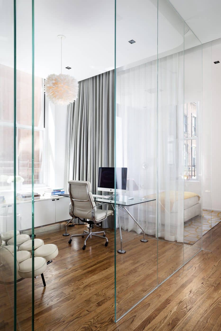 The glass-walled office of interior designer Nina Barnieh-Blair's former home in New York City, a loft in Tribeca 