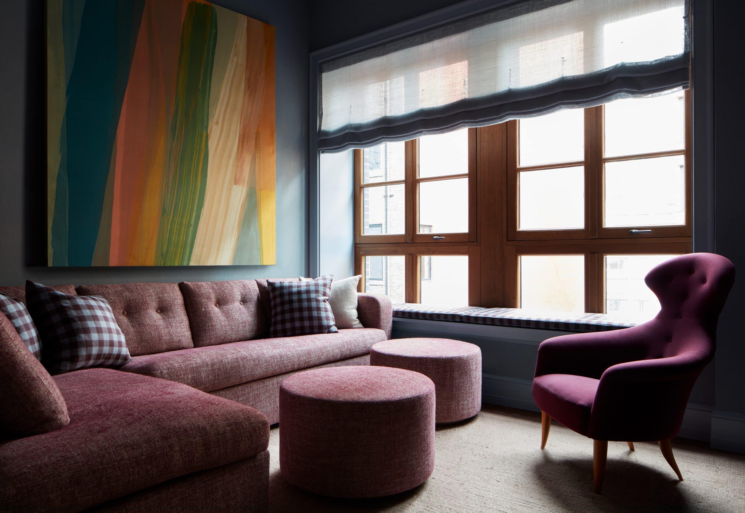Den family room of apartment in Fitzroy building in New York City by interior designer Shawn Henderson