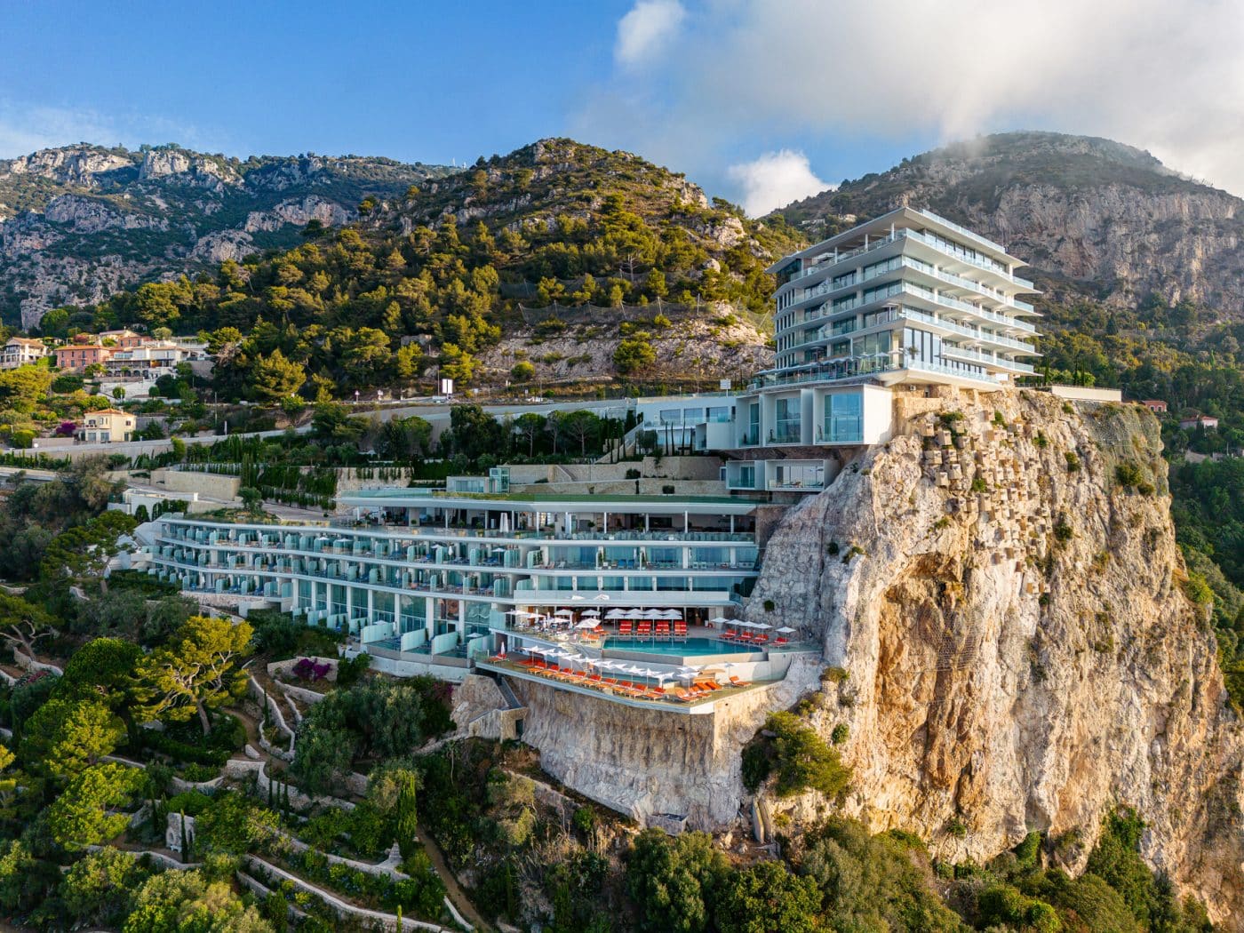 The Maybourne Riviera sits atop rocky peninsula above the picturesque French town of Roquebrune-Cap-Martin. Architect Jean-Michel Wilmotte's undulating, modernist exterior takes inspiration from LE CORBUSIER.