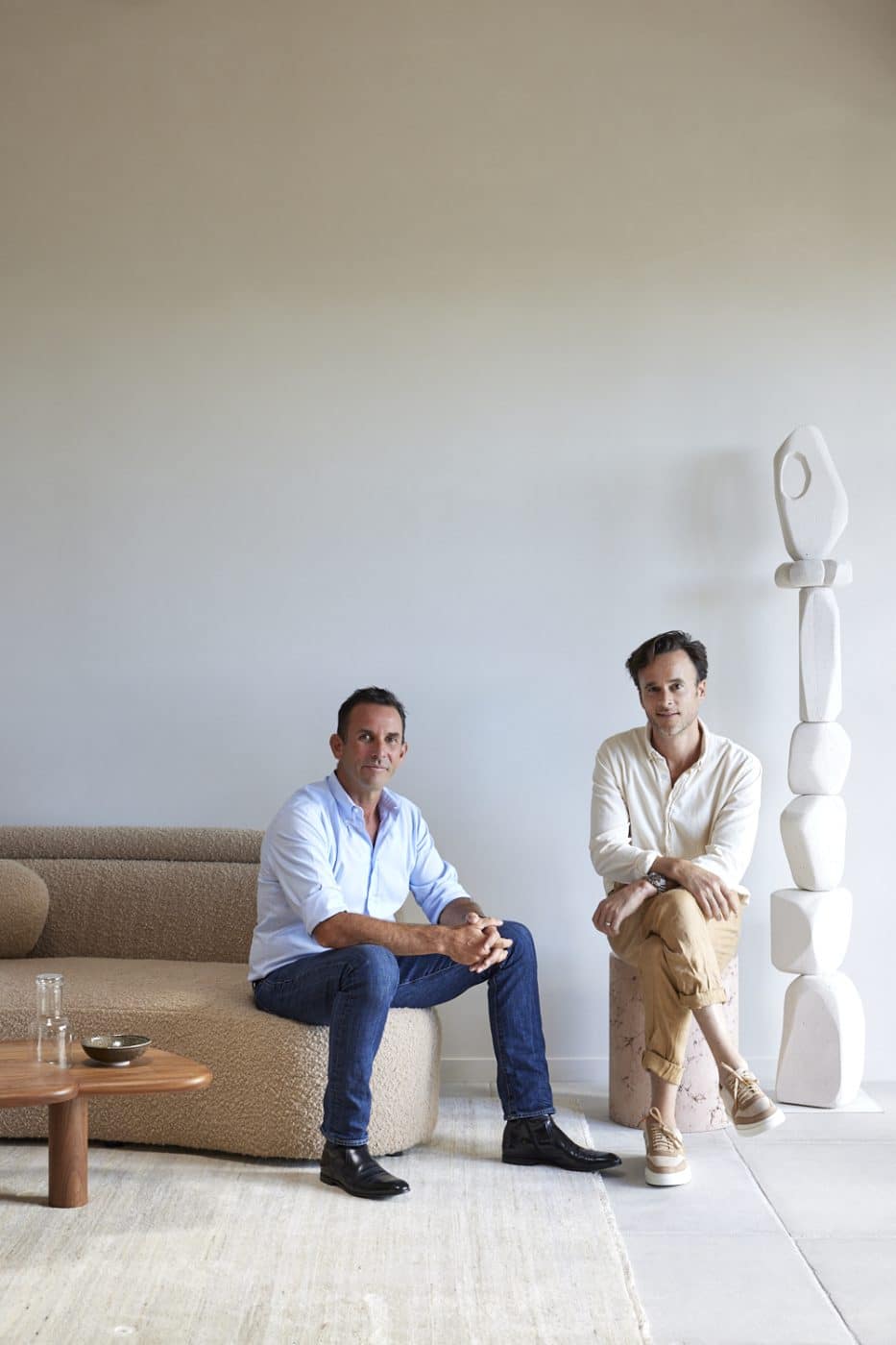 Anthony Wyer, left, and Daniel Boddam sitting in the reception area of Wyer & Co.