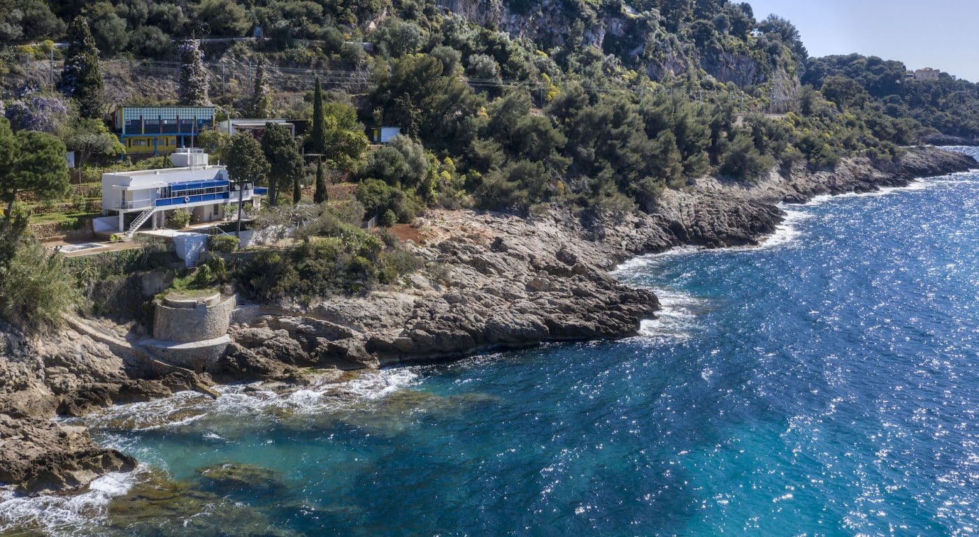 A view of Eileen Gray's house situated along the rocky coast of the Baie de Roquebrune