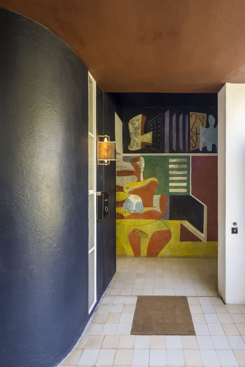 A mural by Le Corbusier in the hallway of E-1027, the modernist home designed by Eileen Gray on the French Riviera