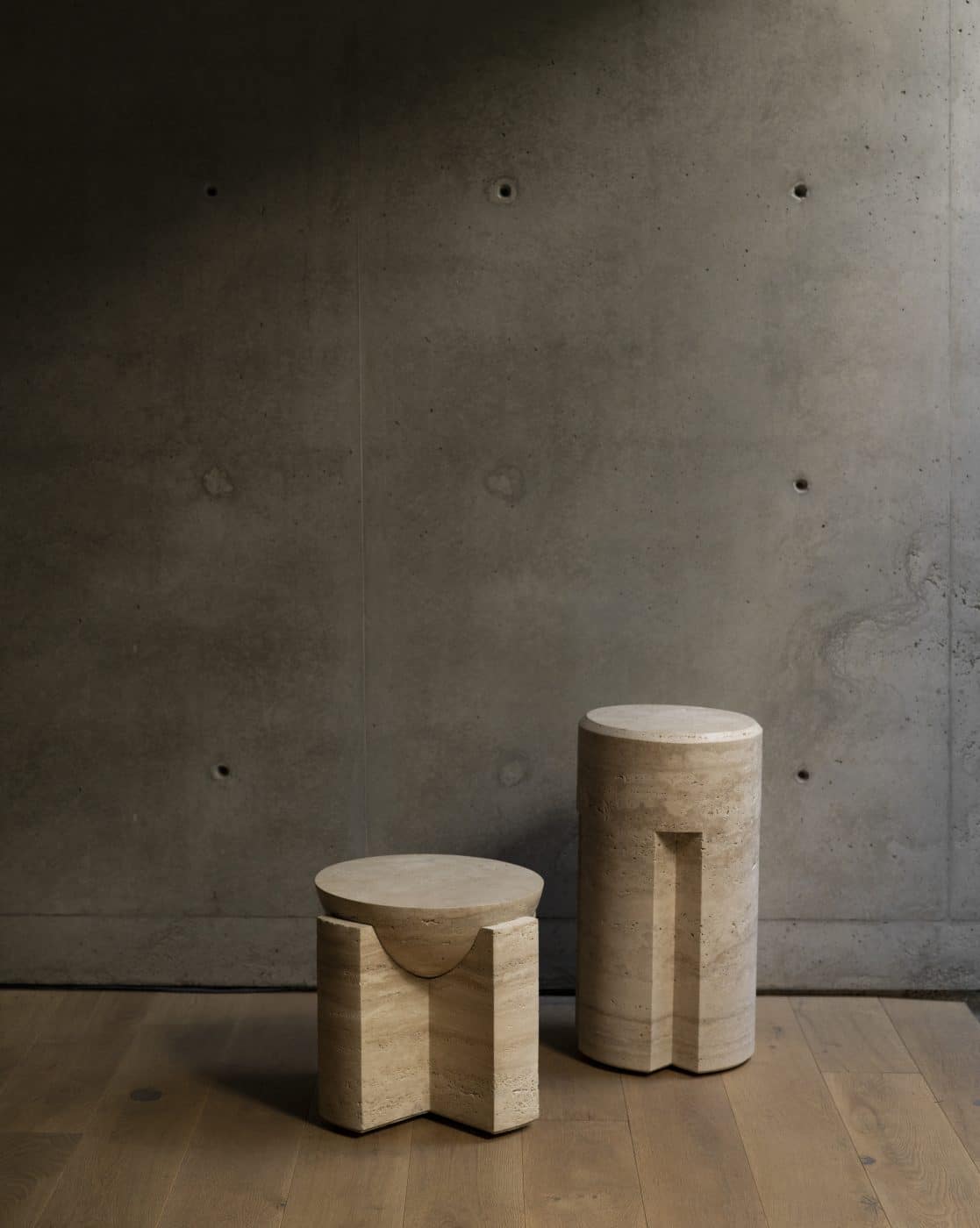 Monolith side table and counter stool in travertine