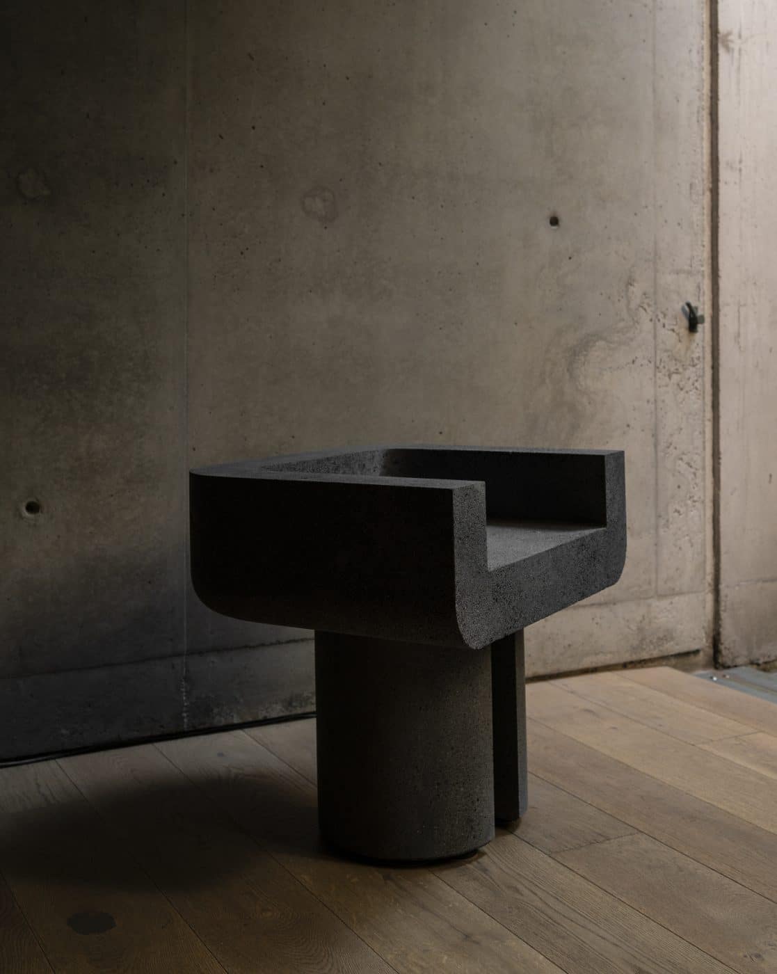 Monolith side chair in lava stone