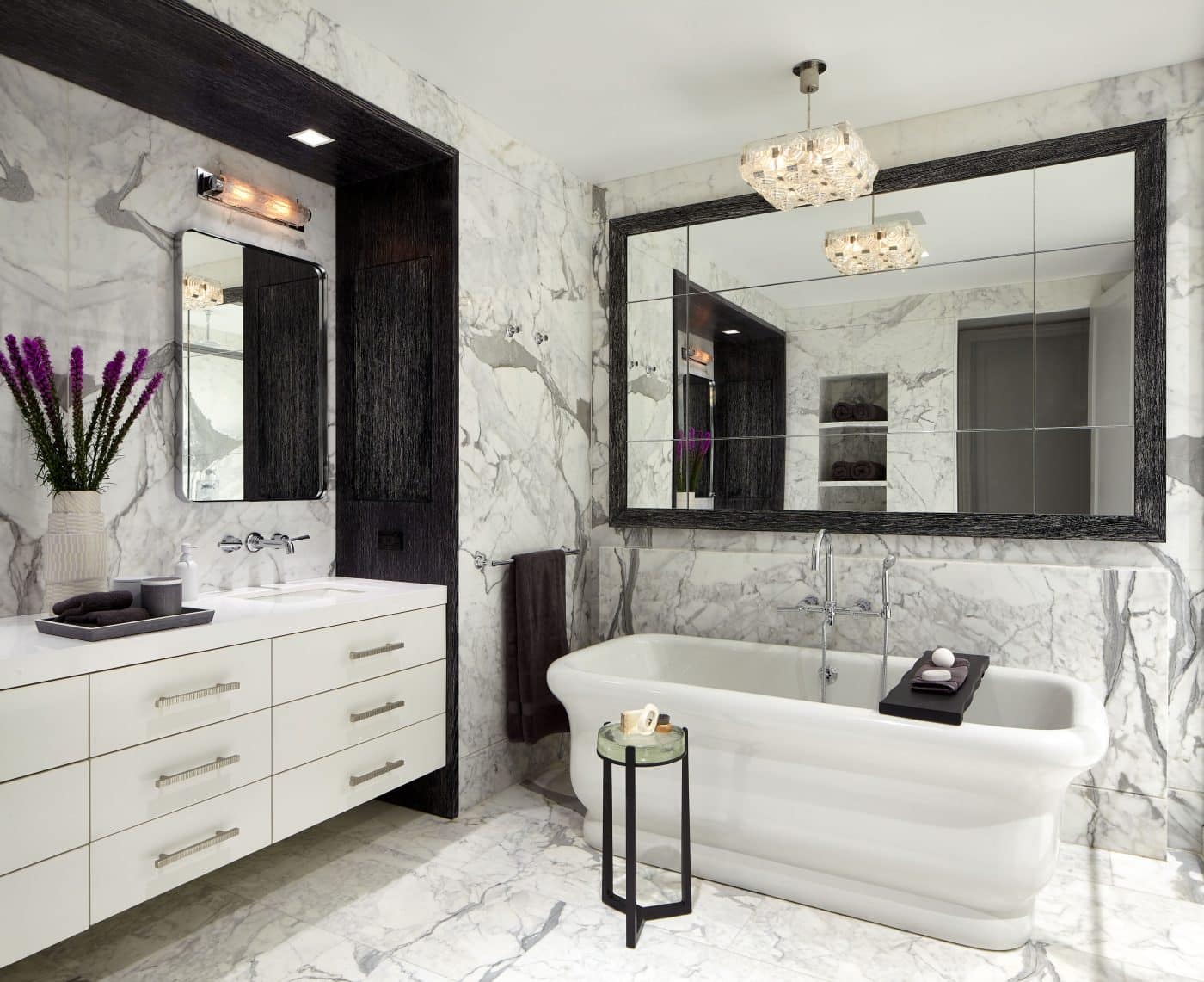 Marble-clad primary bathroom of Judy Dunne designed Soho apartment 