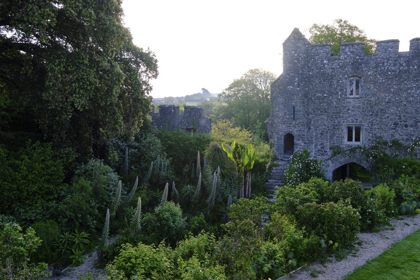 A view of the stone exterior and gardens of Trematon Castle