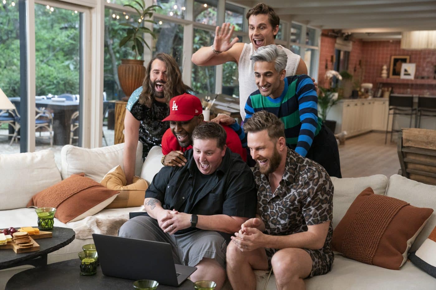 Costars of the Netflix show "Queer Eye" (from left) Jonathan Van Ness, Karamo Brown, Antoni Porowski, Tan France and Bobby Berk with teacher Tara Bordeaux (center)