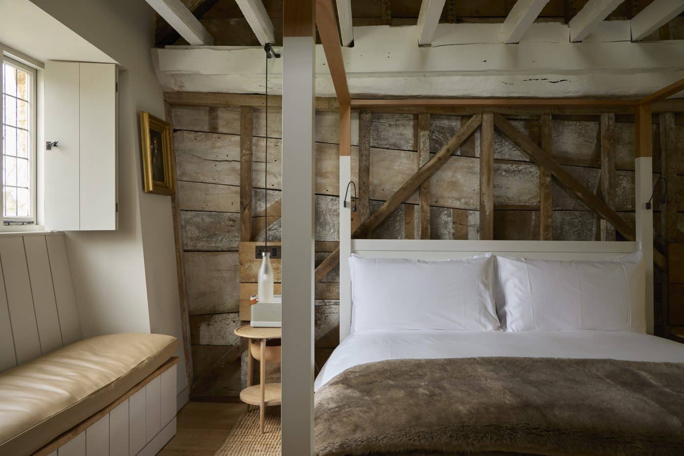 Bedroom in a former cheese-making room at the Farmyard at the Newt