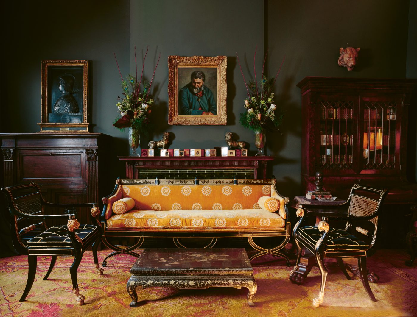 a view of the parlor in Collier Calandruccio's Brooklyn home decorated with antiques