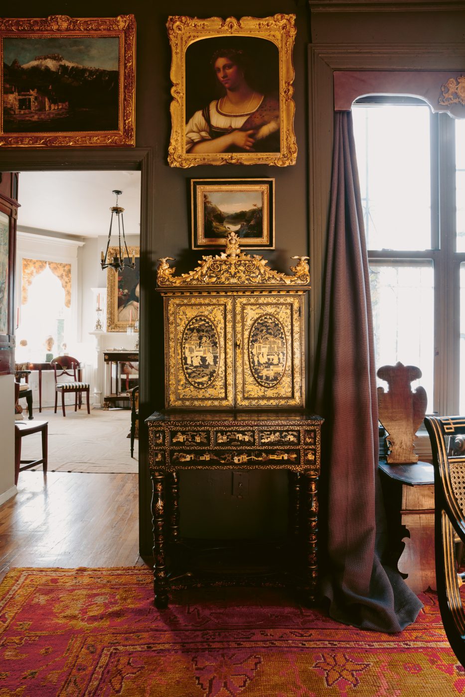 a Chinese export parcel-gilt writing desk in the home of Collier Calandruccio