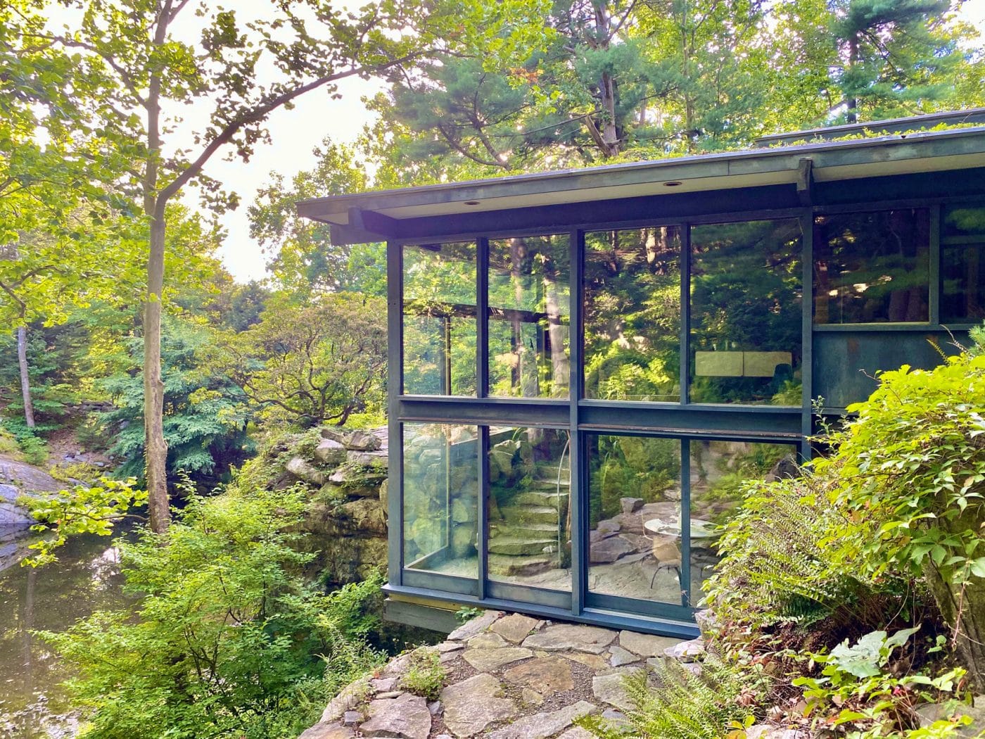 An exterior view of Russel Wright's multilevel, glass-walled house, dubbed Dragon Rock