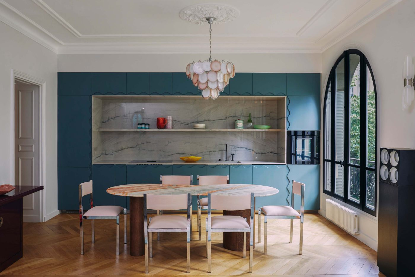 Sebban reveals his love for wave motifs in the kitchen cabinetry in an apartment he decorated in Paris’s 16th arrondissement.