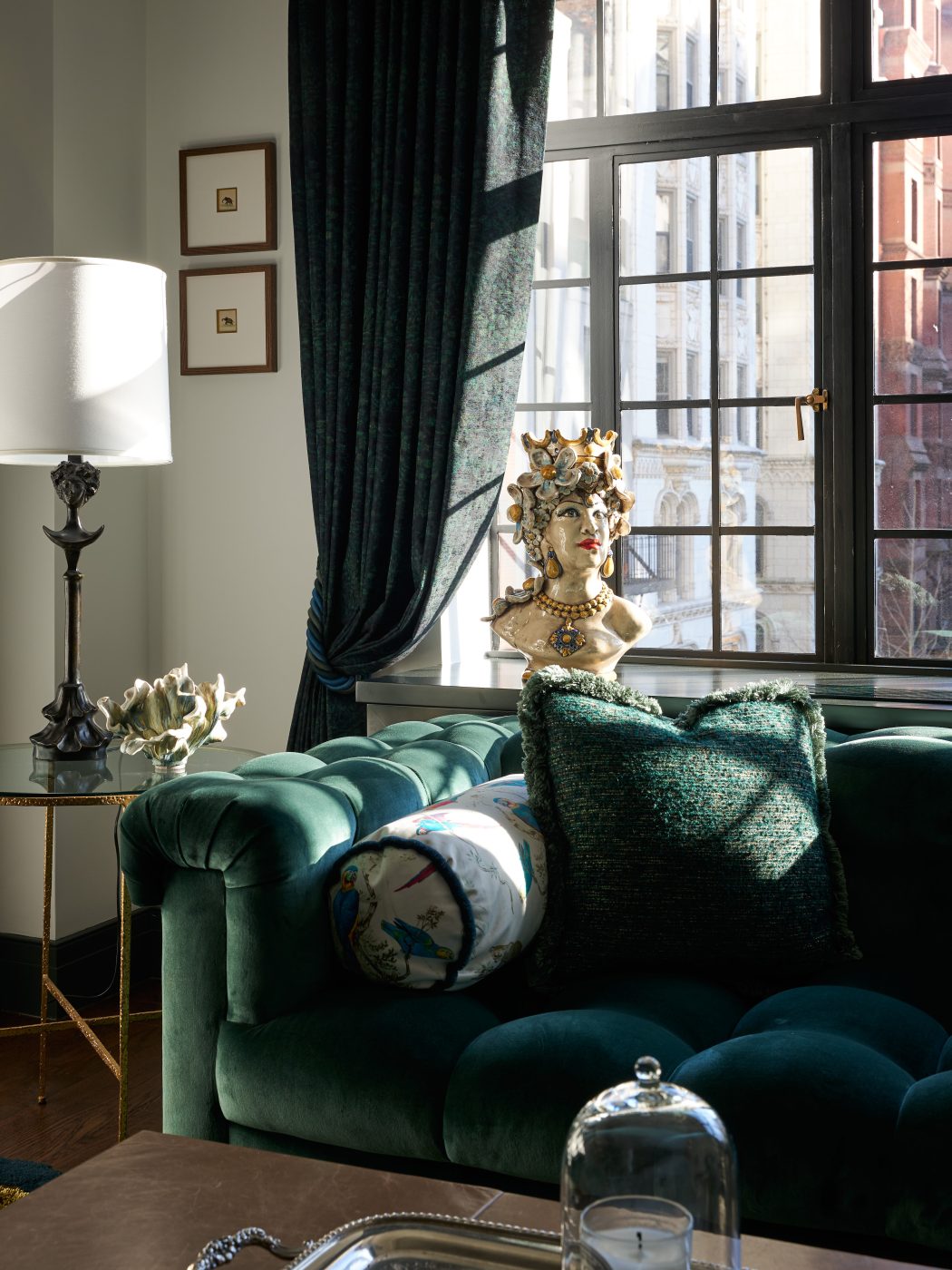 detail of A. Rudin velvet sofa, lamp and decorative ceramic object in living room Bennett Leifer's New York apartment