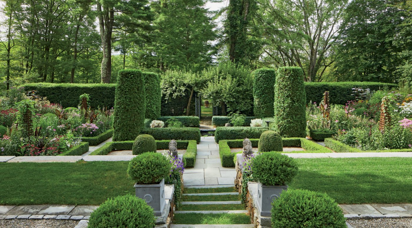 Formal hedged gardens at the northwest connecticut country home of interior designer bunny williams