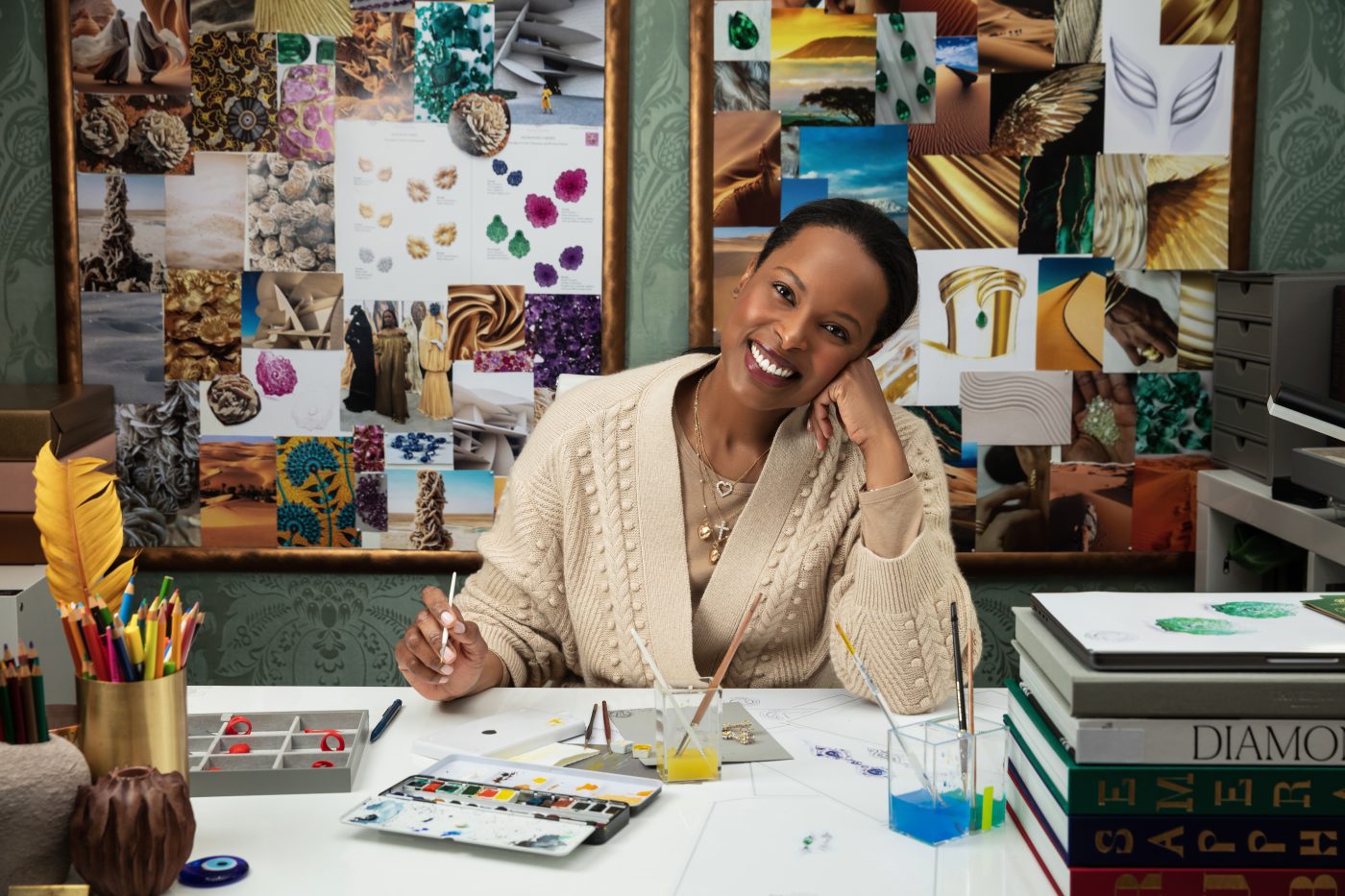 Jewelry designer Vania Leles working on gouache sketches at her desk