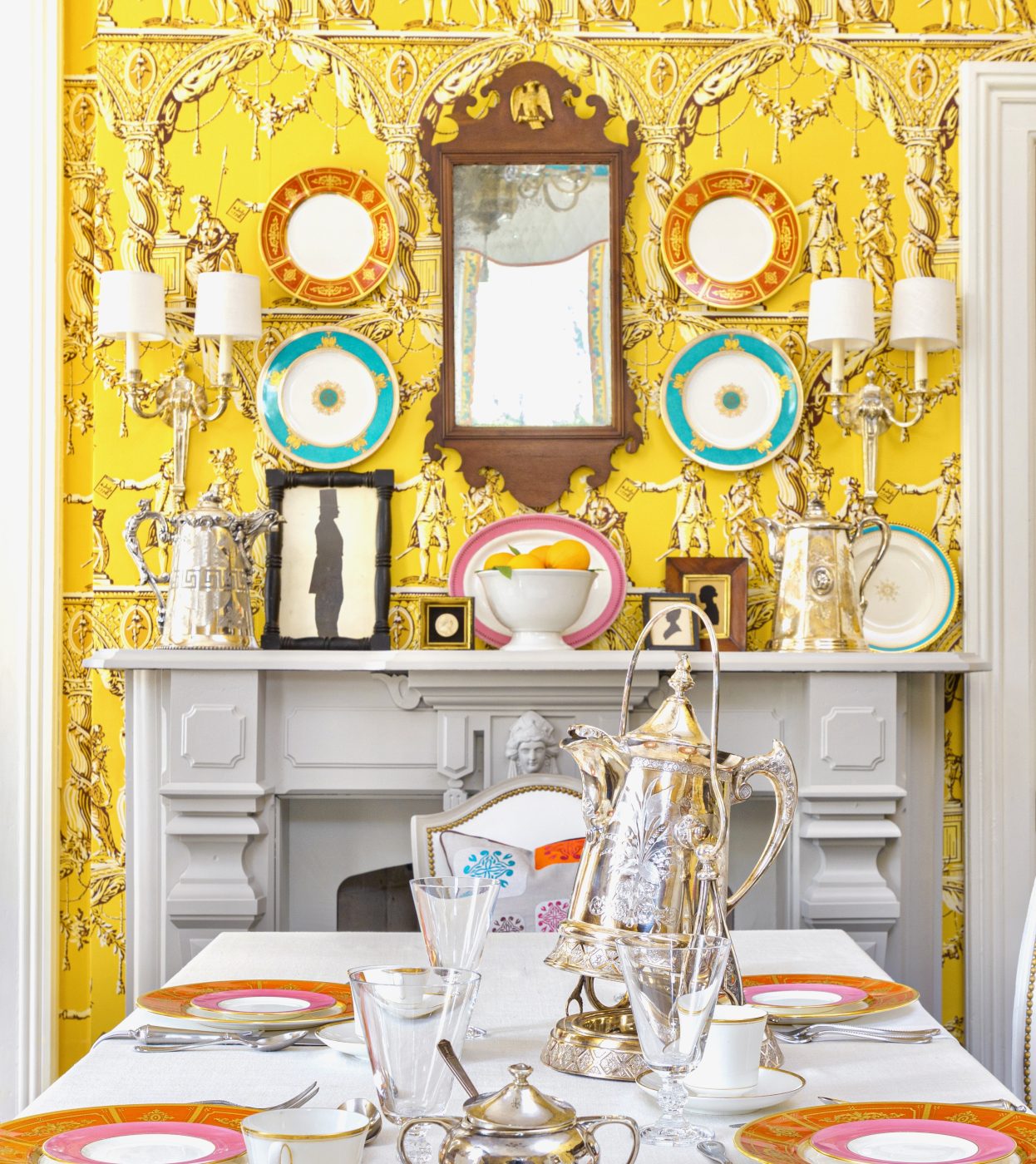 The yellow dining room at the Henry Blosser House, in Malta Bend, Missouri, designed by Kelee Katillac