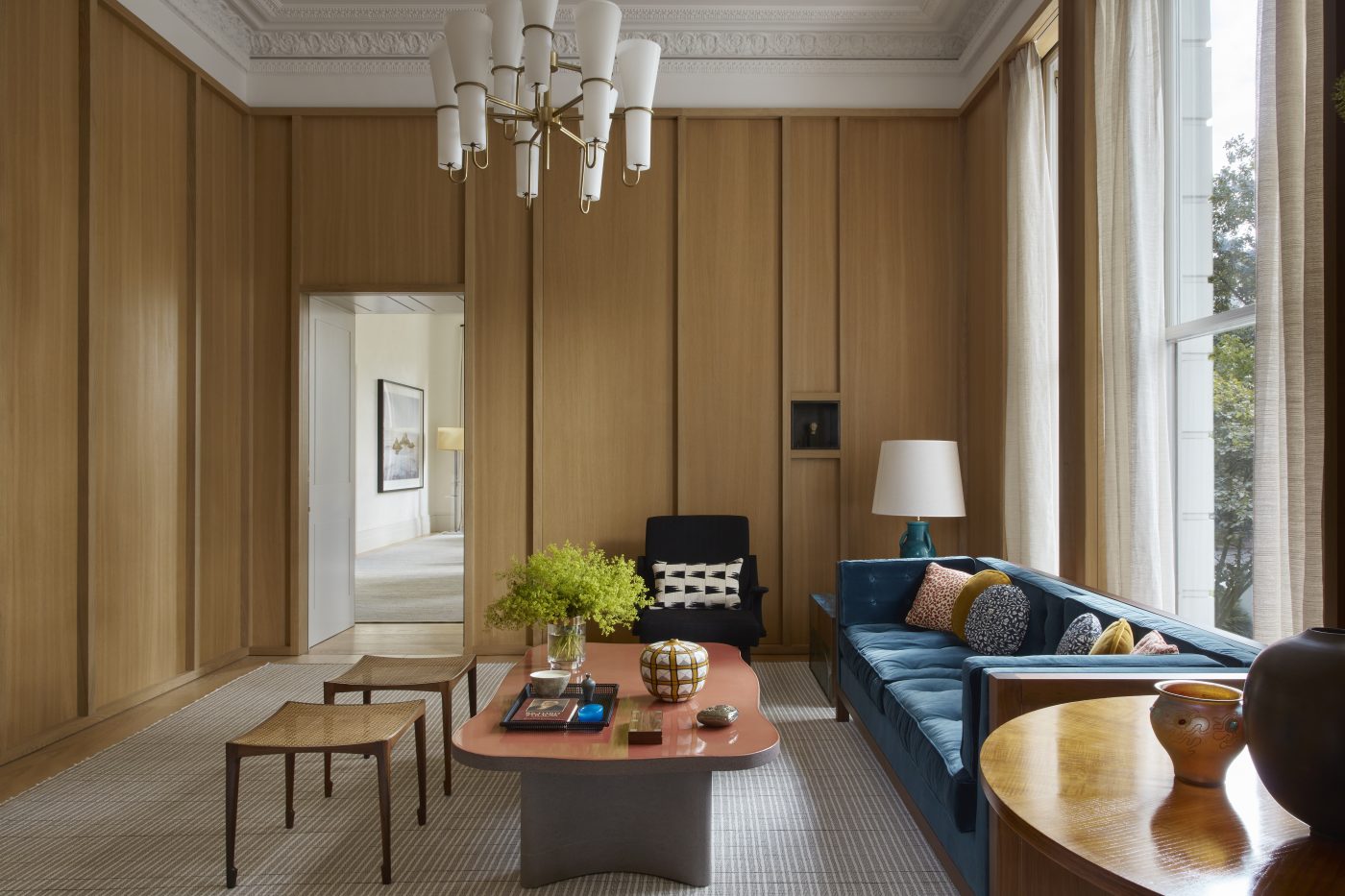 wood paneled living room by Bryan O'Sullivan