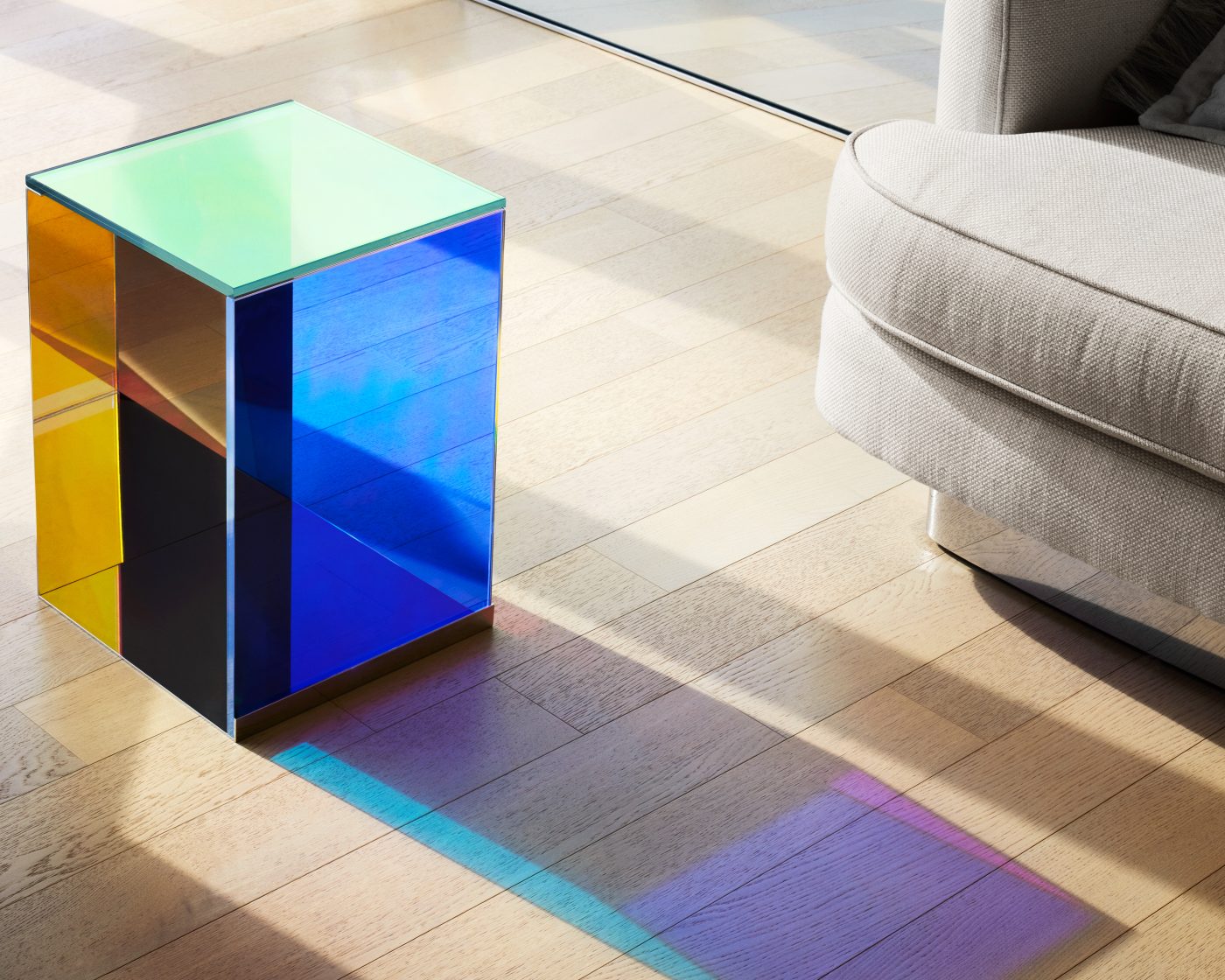 Lauren Rottet's Dichroic side table refracts the sunlight in her New York apartment