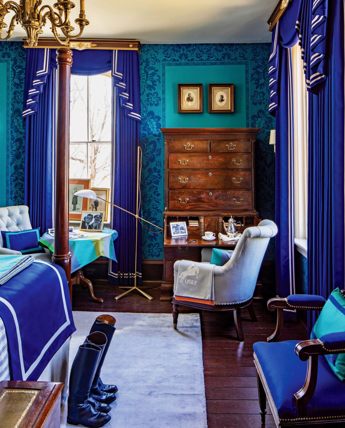 A blue bedroom at the Henry Blosser House, in Malta Bend, Missouri, designed by Kelee Katillac