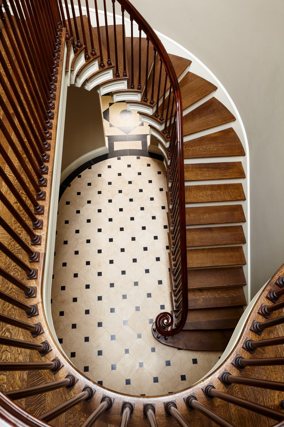 Bird's eye image of oval stair hall in Dutchess County New York Regency-style home by Gil Schafer III in his new book Home at Last: Enduring Design for the New American Home Rizzoli publisher written with Mark Kristal
