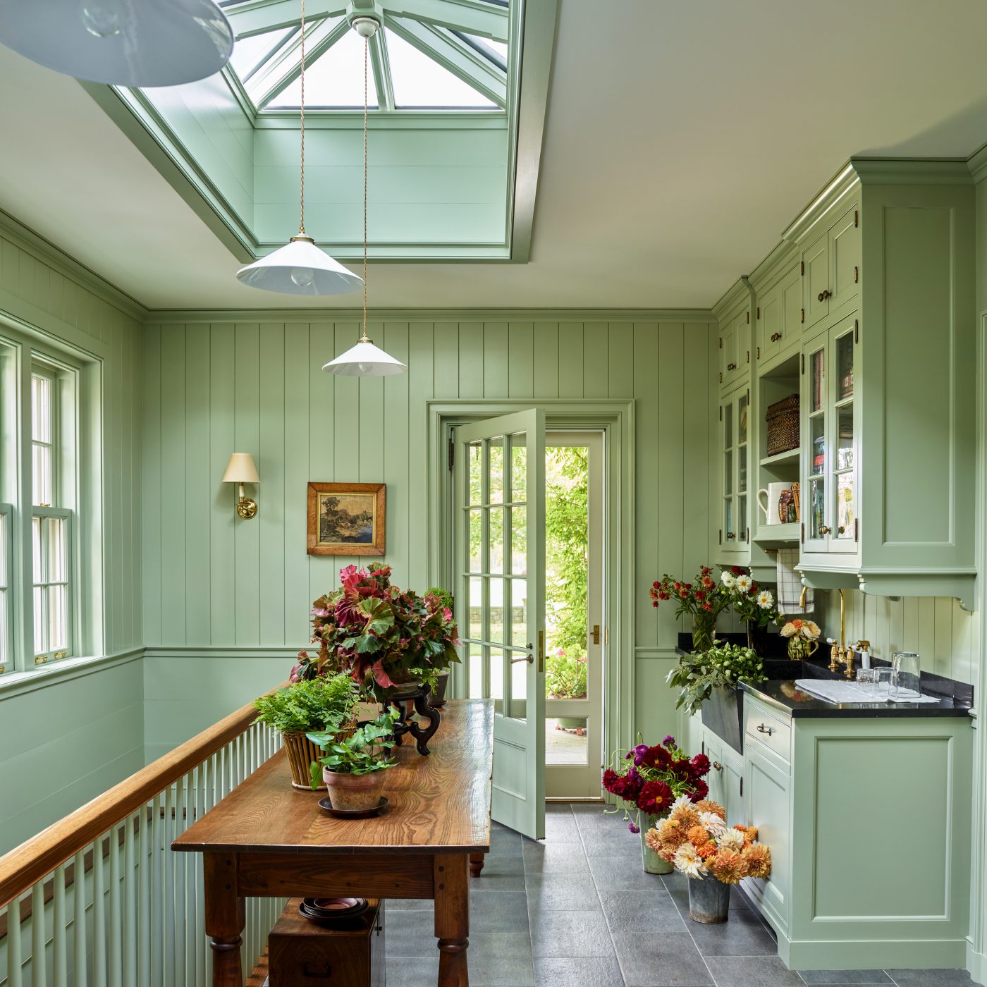 Skylit green mudroom in Dutchess County New York Regency-style home by Gil Schafer III in his new book Home at Last: Enduring Design for the New American Home Rizzoli publisher written with Mark Kristal